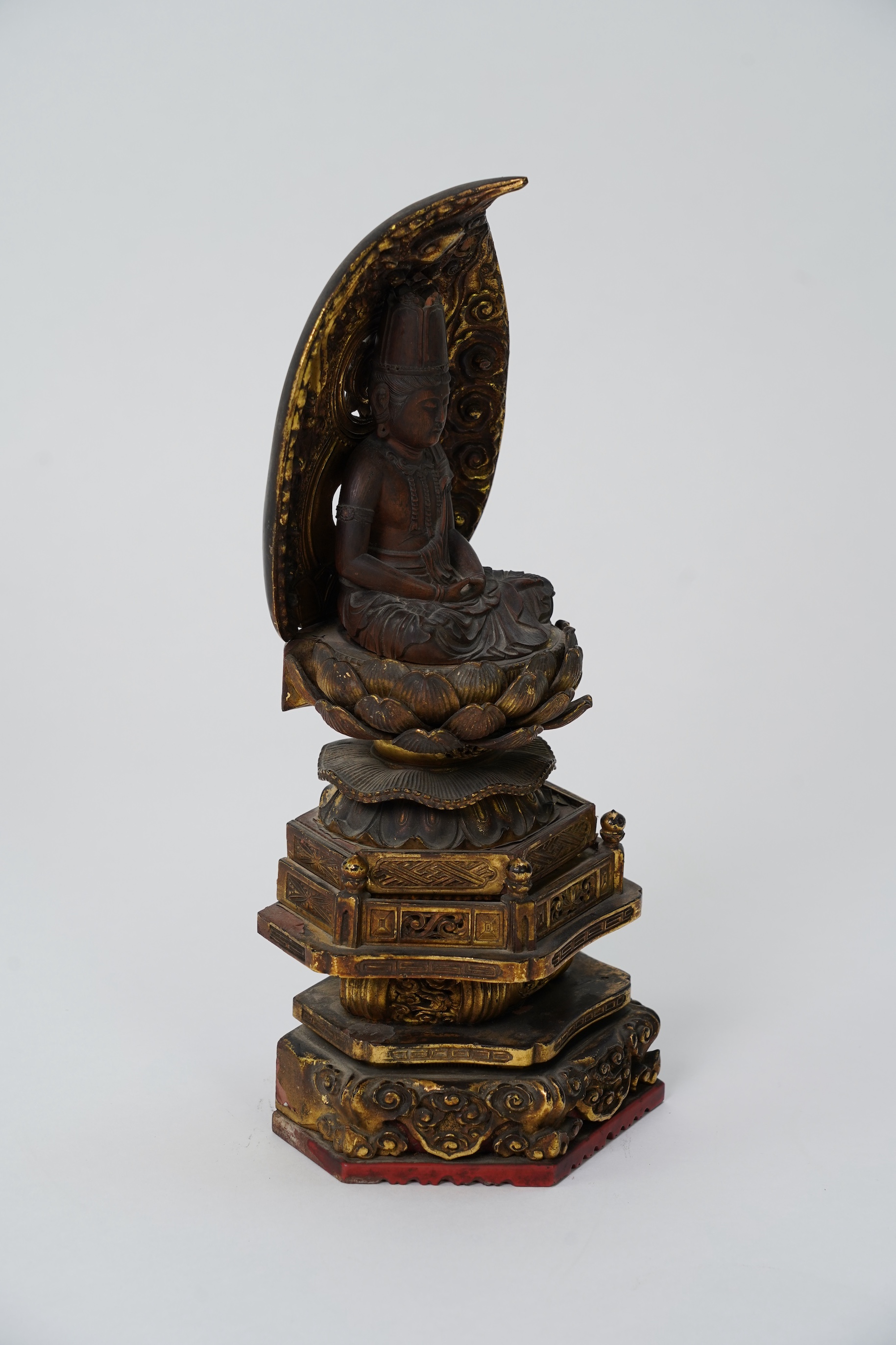 A Japanese Buddhist boxwood and giltwood seated figure of Dainichi Nyorai, 19th century